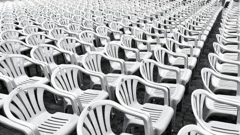 Patterns empty chairs black and white arranged for a function Stock Photos