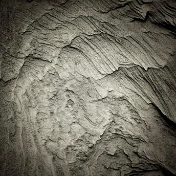 Patterns of erosion of sand in the background Stock-Fotos
