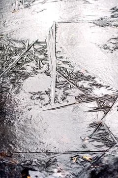 The patterns on the frozen ice Stock Photos