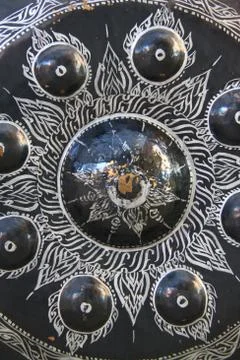 Patterns on the gong Stock Photos