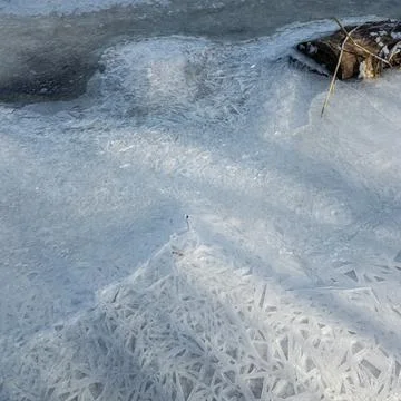 Patterns on ice. Winter window frost time lapse of frozen crystals or reali.. Stock Photos