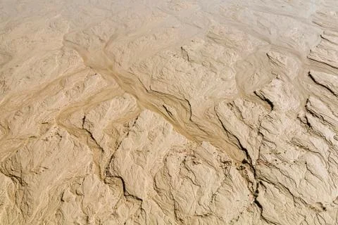 Patterns left by flowing water on a beach in Fuerteventura, Spain. Stock Photos