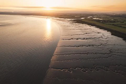 Patterns in the lit sand 写真素材