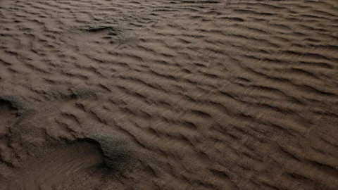 Patterns in nature. Shadows cast from sunset in sand in middle eastern Stock Footage 238911557
