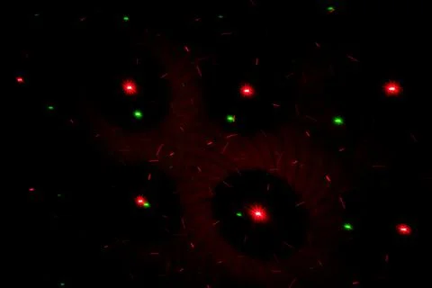 Patterns in red and green on the wall. Laser background. Party or disco conce Stock Photos