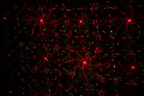 Patterns in red and green on the wall. Laser background. Party or disco conce 스톡 사진