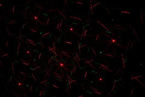 Patterns in red and green on the wall. Laser background. Party or disco conce 스톡 사진