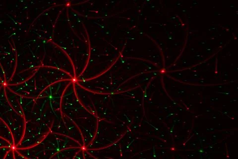 Patterns in red and green on the wall. Laser background. Party or disco conce 스톡 사진
