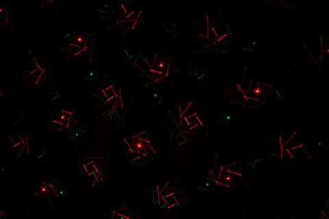 Patterns in red and green on the wall. Laser background. Party or disco conce 스톡 사진
