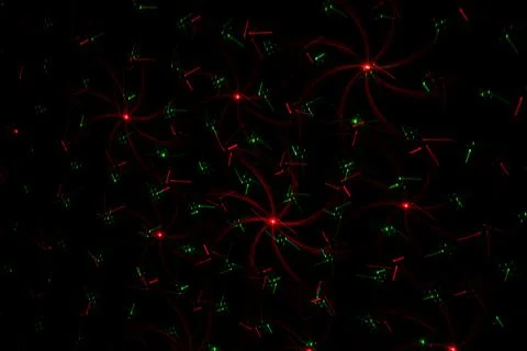 Patterns in red and green on the wall. Laser background. Party or disco conce 스톡 사진