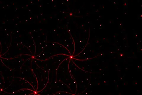 Patterns in red and green on the wall. Laser background. Party or disco conce Stock Photos