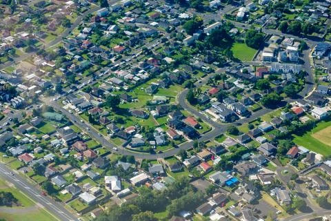 Patterns of rooftops and streets directly below in suburban zones Stock Photos