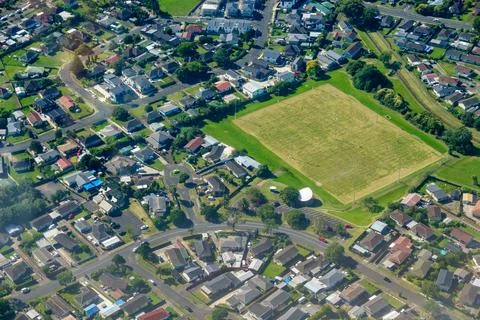Patterns of rooftops and streets directly below in suburban zones Stock Photos
