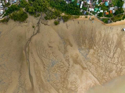 Patterns in the sand at water low tide.Drone aerial view nature sea backgroun Stock Photos