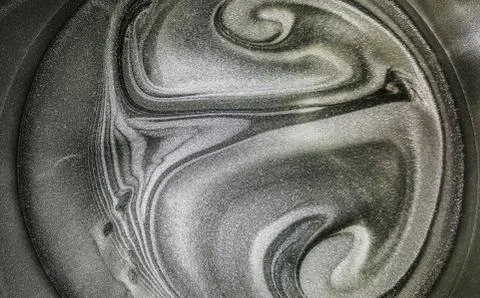 The patterns on the silver paint. Abstract image with streaks and patterns on Foto stock