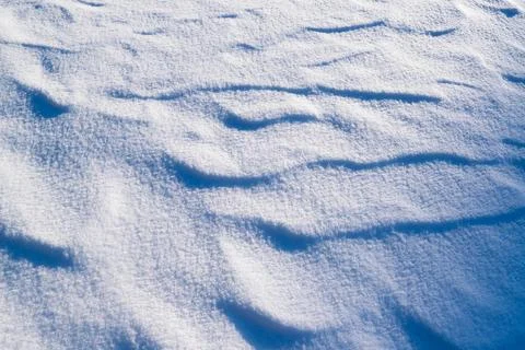 Patterns in the snow. Winter background. Stock Photos