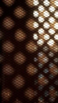 Patterns of sun rays coming from a traditional Nepali window Stock Photos