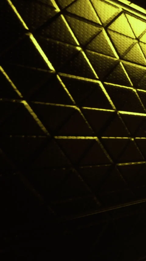 Patterns on a textured surface with yellow light during a late evening Stock Footage 334171993