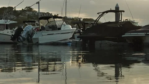 Patterns in the water around boats docked in Sydney 4K Stock Footage 260108650