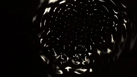 Patterns in a wave tank demonstrate particle-wave duality. Stock Footage 144492347