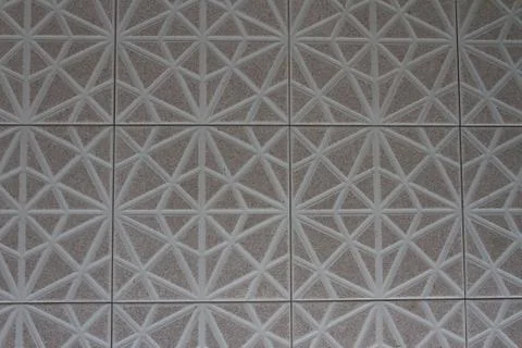 Patterns on a white stone of geometric shape, tiles Stock Photos