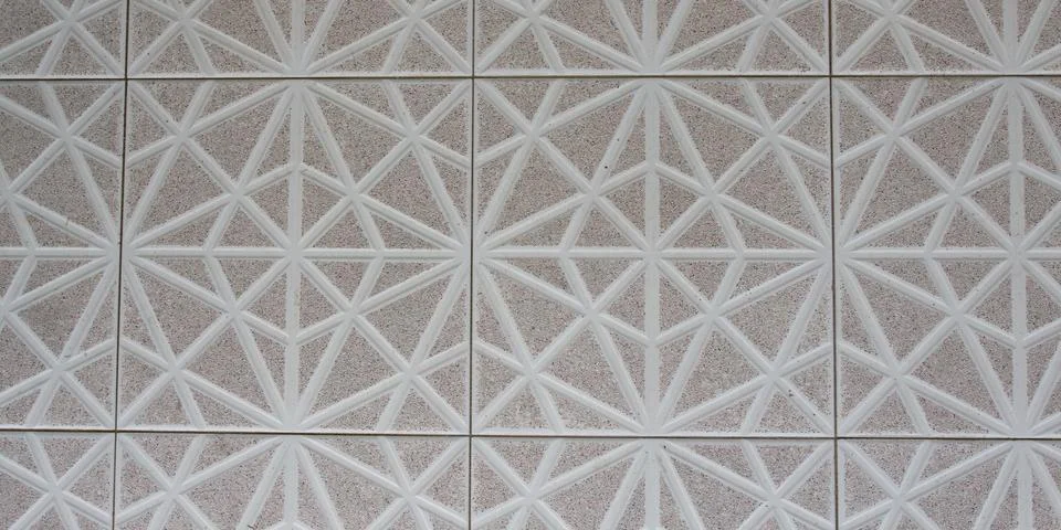 Patterns on a white stone of geometric shape, tiles Stockfoto's