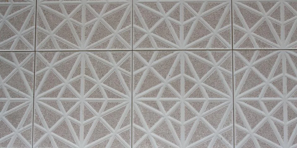 Patterns on a white stone of geometric shape, tiles Stockfoto's