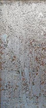 Patterns on the window in winter. Winter drawing on the window. Natural patte Stock Photos