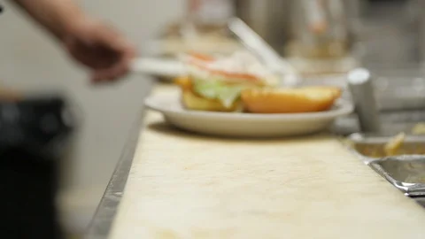 Patty being placed on top of Burger Stock Footage 121168230