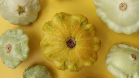 Pattypan squashes on a yellow background. Stock Footage 202273508