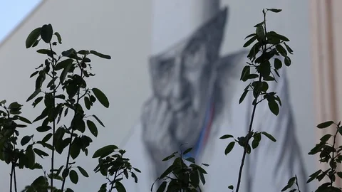 Paul Bocuse image on the wall, Lyon, France. Video stock 129835236