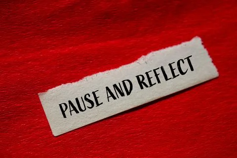 Pause and reflect message written on torn paper with red background. Conceptu Stock Photos