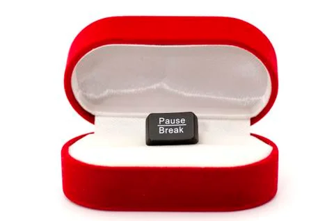 Pause, break key in ring case concept Stock Photos