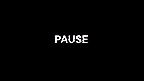 Pause  text with screen effects of technological glitches. Looped Stock Footage 270974835