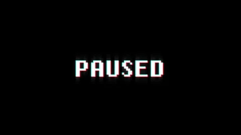 Paused 8-bit text pixel dynamic glitch animation video game effect Stock Footage 313076116