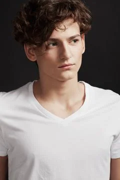 Pausing for thought. A handsome young man with elegant facial features looking Stock Photos