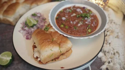 Pav bhaji served with thich vegetable curry in plate. Stock Footage 282766431