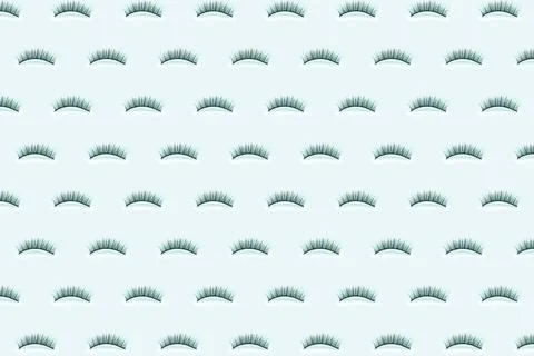 Pave eyelashes on blue background. Pattern. Stock Photos