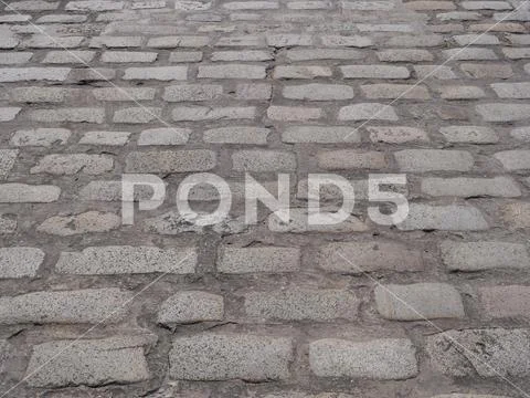 Paved cobble road background texture Stock Photos