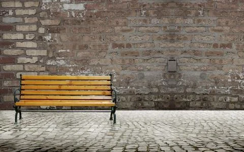 Paved road and brick wall Foto stock