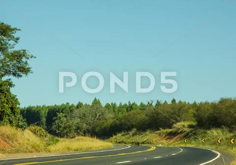 Paved road curve Stock Photos