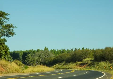 Paved road curve Stock Photos