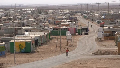 Paved road in the largest Syrian refugee camp (Zaatari), located in North Jordan Stock Footage