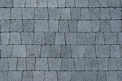 Paved track of gray trapezoidal brick Stock-Fotos
