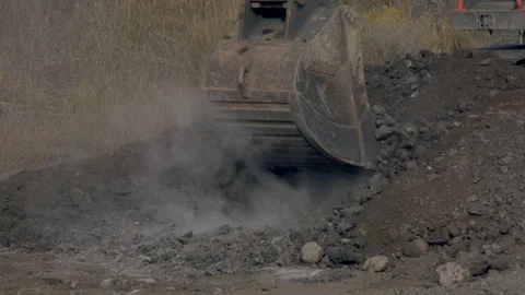 Pavement being removed by excavator, 4k Stock Footage 253436682