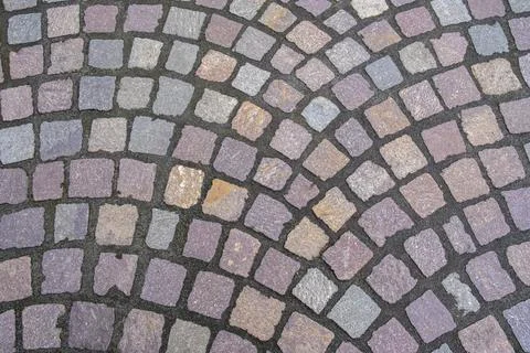 Pavement made of irregularly arranged, square paving stones in shades of grey, 스톡 사진