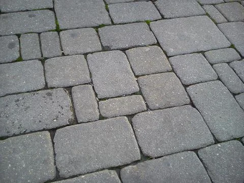 A pavement made of rectangular stone slabs. 스톡 사진
