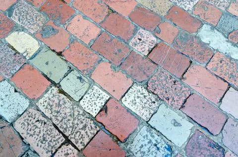Pavement of old multi-colored stone Stock Photos