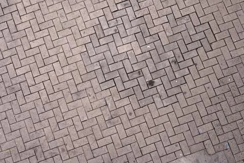 A pavement pattern found in the busy area of Central District,HK Stock Photos