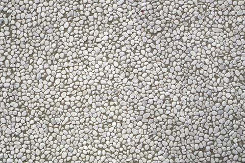 Pavement pebless stone seemless background texture Foto stock